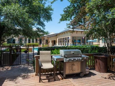 Vista Ridge Apartments-in-San-Antonio-TX-Outdoor-Gilling-Area-off-Pool-Patio